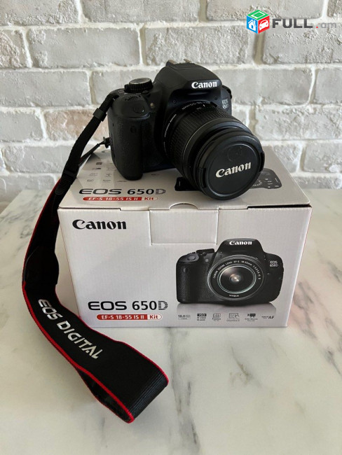 Canon 650D DLSR camera with 18-55mm Lens.