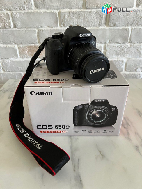 Canon 650D DLSR camera with 18-55mm Lens.